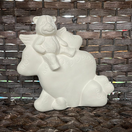 Small heart statue with cupid bear